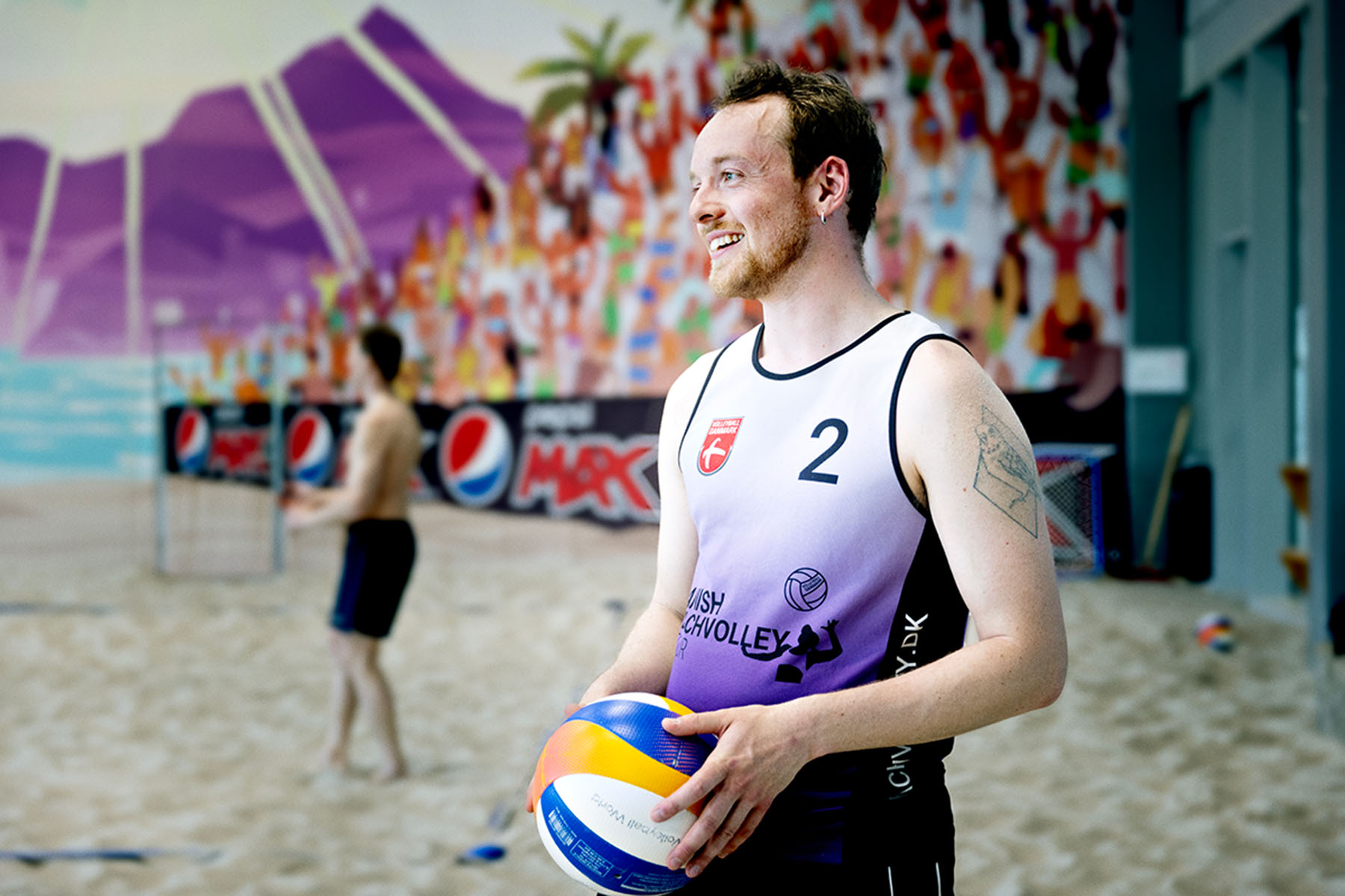 Hans Kristian Holm spiller beachvolley